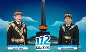 Wali Kota dan Wakil Wali Kota mengenakan busana khas, tampak dalam pamflet yang diunggah di Instagram @pemkotmalang